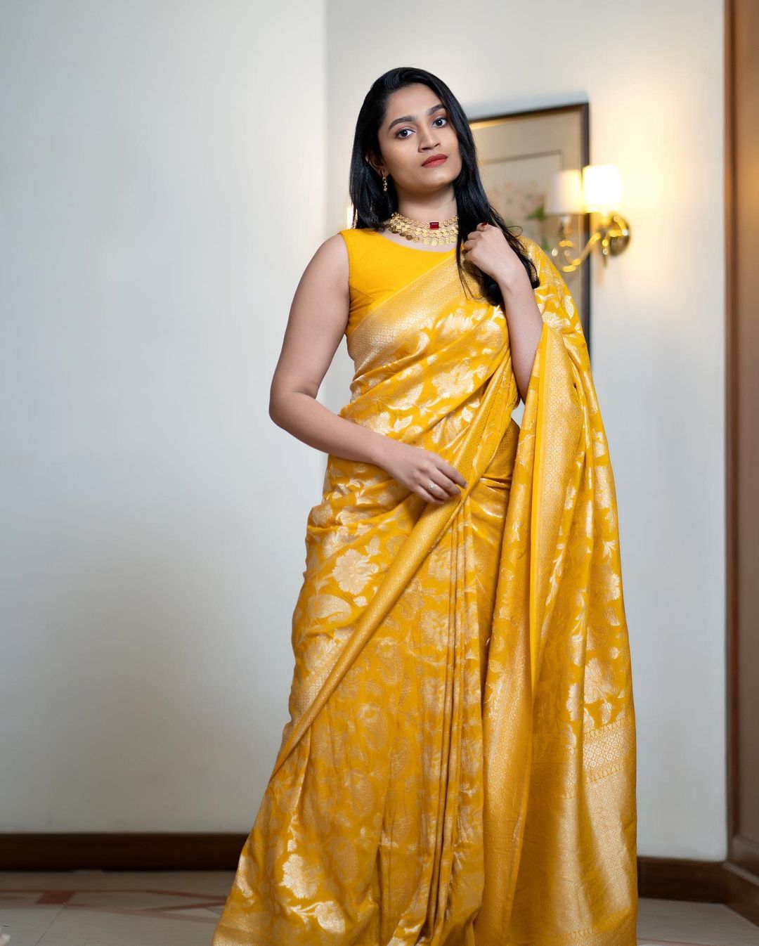 Deserving Yellow Soft Silk Saree with Energetic Blouse Piece