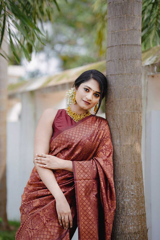 Enigmatic Pure Silk Saree in Maroon with a Snazzy Blouse Piece