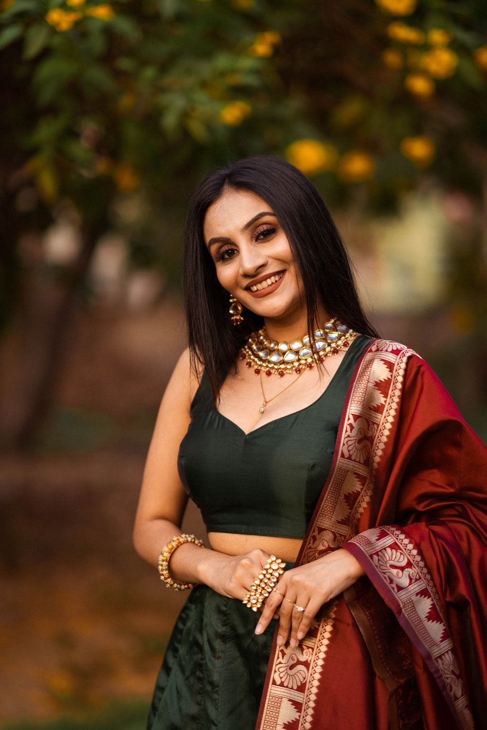 Unique bridal necklace with polki and jadau stones with maroon lehenga for  wedding. See more on wedmegoo… | Maroon lehenga, Bridal photoshoot, Indian  bridal fashion