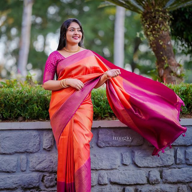 Twirl in Style with Incomparable Orange Pink Pure Soft Silk Saree